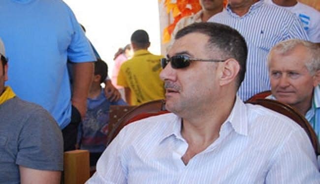 والد القاتل، "الشهيد" هلال الاسد قائد قوات الدفاع الوطني السوري